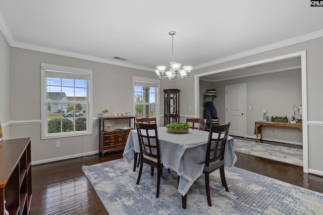 2 Casey Dr, Elgin, SC 29045 - dining space featuring a chandelier, crown molding, wood finished floors, and baseboards