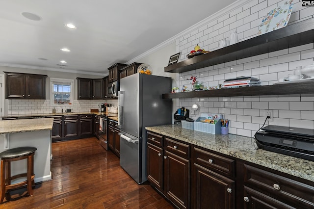 2 Casey Dr, Elgin, SC 29045 - kitchen featuring stainless steel appliances, backsplash, ornamental molding, open shelves, and light stone counters