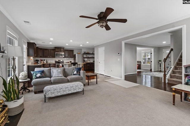 2 Casey Dr, Elgin, SC 29045 - living room featuring ornamental molding, dark carpet, recessed lighting, a ceiling fan, and stairs