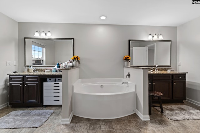 2 Casey Dr, Elgin, SC 29045 - full bathroom with a bath, two vanities, baseboards, and tile patterned flooring