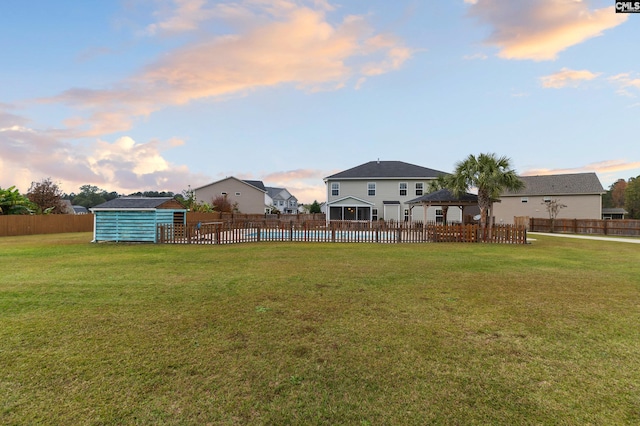 2 Casey Dr, Elgin, SC 29045 - yard at dusk with a gazebo, a pool, and an outdoor structure