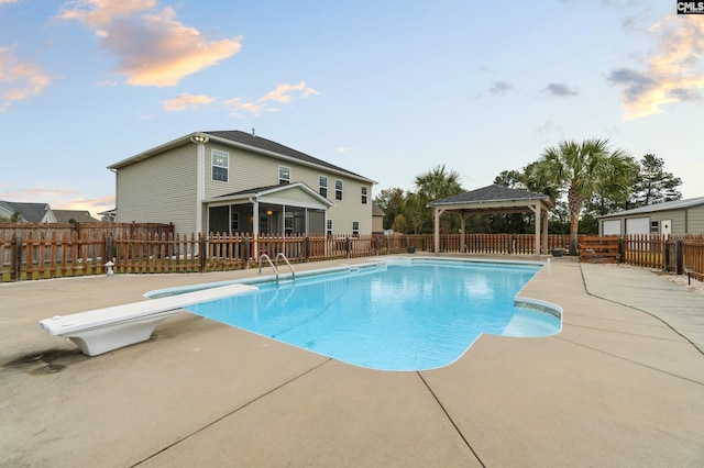 2 Casey Dr, Elgin, SC 29045 - view of swimming pool featuring a gazebo, a diving board, a patio area, and a fenced backyard