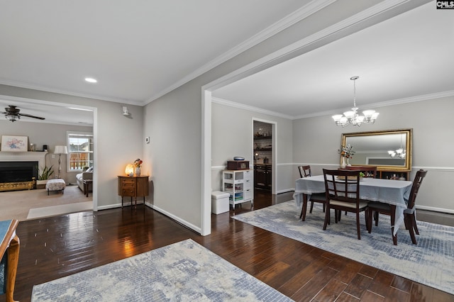 2 Casey Dr, Elgin, SC 29045 - dining area with wood finished floors, crown molding, ceiling fan, a chandelier, and baseboards