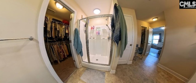 1 Twinspur Ct, Columbia, SC 29229 - full bathroom featuring a shower stall, baseboards, and a spacious closet
