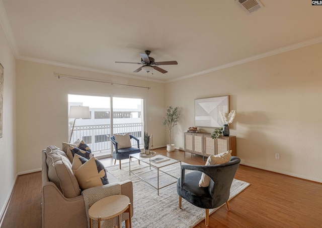 1085 Shop Rd Unit 337, Columbia, SC 29201 - living area featuring a ceiling fan, wood finished floors, baseboards, and crown molding