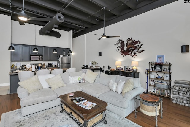 1049 Key Rd Unit 22, Columbia, SC 29201 - living room with a high ceiling, wood finished floors, a ceiling fan, and baseboards