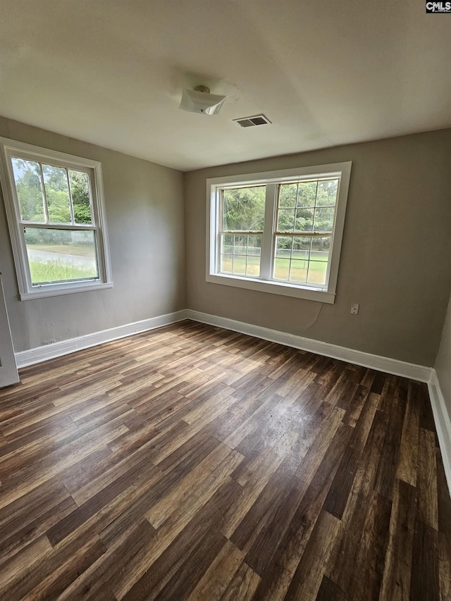 202 Crawford Rd, Columbia, SC 29203 - empty room featuring dark wood-style flooring and baseboards