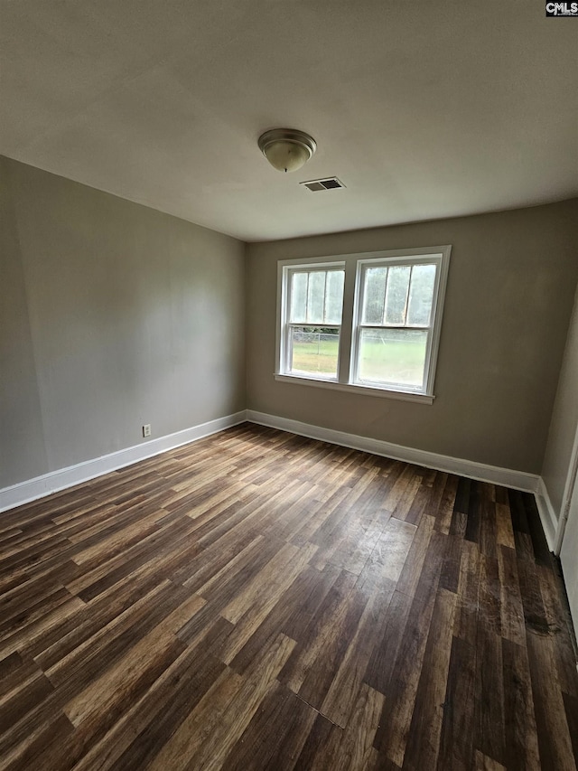 202 Crawford Rd, Columbia, SC 29203 - spare room featuring dark wood-style flooring and baseboards