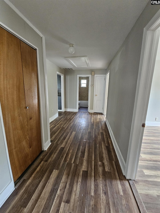 202 Crawford Rd, Columbia, SC 29203 - corridor with wood finished floors, attic access, and baseboards