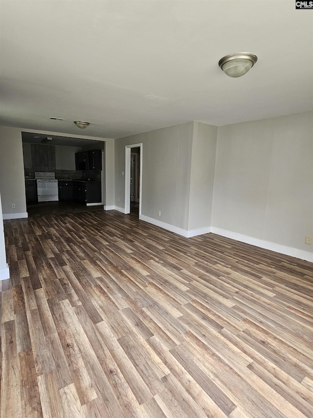 202 Crawford Rd, Columbia, SC 29203 - unfurnished living room with wood finished floors and baseboards