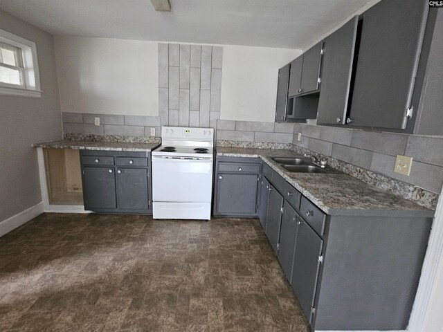202 Crawford Rd, Columbia, SC 29203 - kitchen featuring white electric range, a sink, gray cabinets, and dark floors