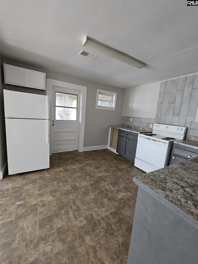 202 Crawford Rd, Columbia, SC 29203 - kitchen featuring white appliances and baseboards