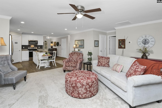 206 Carriagebrook Cir, Camden, SC 29020 - living area with ornamental molding, a ceiling fan, dark wood-style flooring, and recessed lighting