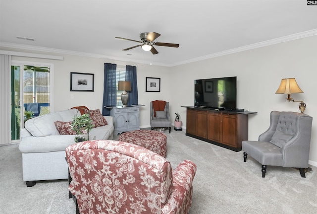 206 Carriagebrook Cir, Camden, SC 29020 - living room with light colored carpet, ornamental molding, ceiling fan, and baseboards