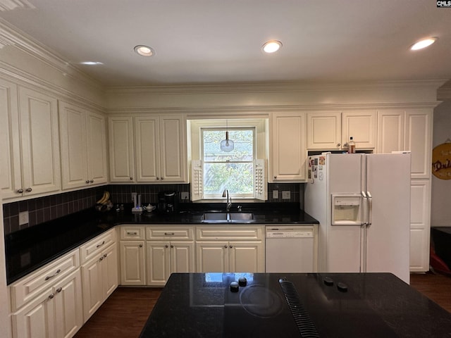 219 Mallet Hill Rd, Columbia, SC 29223 - kitchen with a sink, white appliances, dark countertops, white cabinets, and tasteful backsplash