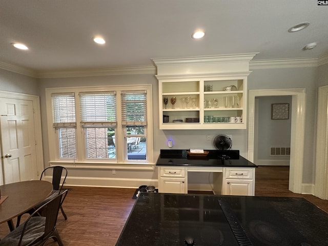 219 Mallet Hill Rd, Columbia, SC 29223 - home office with built in study area, dark wood-style floors, baseboards, ornamental molding, and recessed lighting