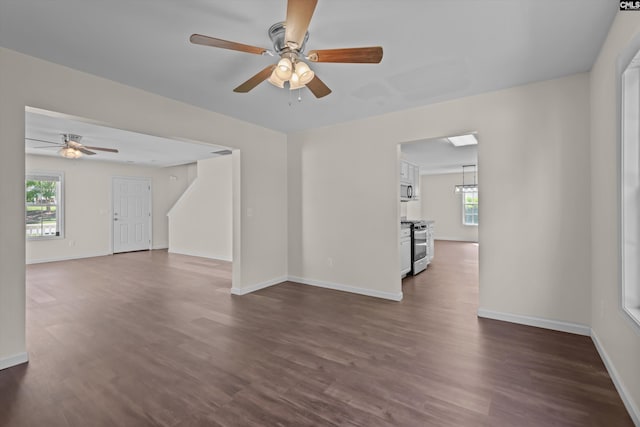 116 Harmon Creek Ct, Lexington, SC 29072 - unfurnished living room featuring a ceiling fan, baseboards, and dark wood-type flooring