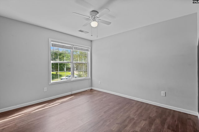116 Harmon Creek Ct, Lexington, SC 29072 - spare room featuring ceiling fan, dark wood-style floors, and baseboards