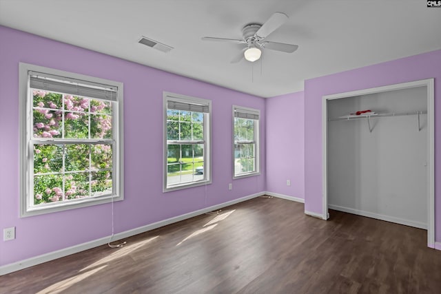 116 Harmon Creek Ct, Lexington, SC 29072 - unfurnished bedroom featuring dark wood-style flooring, baseboards, a ceiling fan, and a closet