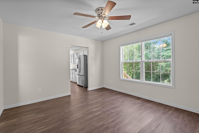 116 Harmon Creek Ct, Lexington, SC 29072 - spare room with baseboards, dark wood-style floors, and a ceiling fan