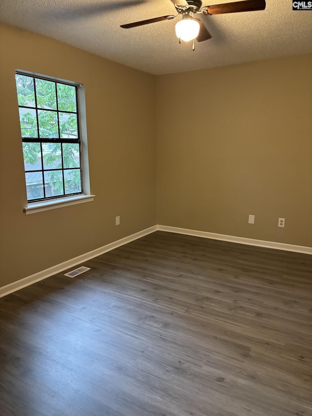 6 Bradley Ct Unit B, Cayce, SC 29033 - spare room with a ceiling fan, dark wood-type flooring, baseboards, and a textured ceiling