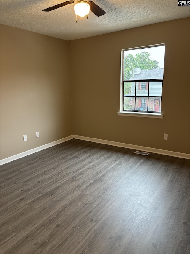 6 Bradley Ct Unit B, Cayce, SC 29033 - spare room with a ceiling fan, dark wood-type flooring, baseboards, and a textured ceiling