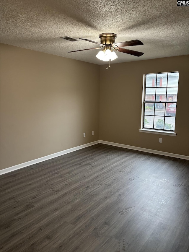 6 Bradley Ct Unit B, Cayce, SC 29033 - spare room with dark wood-type flooring, baseboards, a ceiling fan, and a textured ceiling