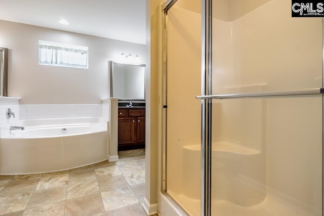 1811 Wildwood Ln, Elgin, SC 29045 - full bath featuring a shower stall, a garden tub, vanity, and recessed lighting