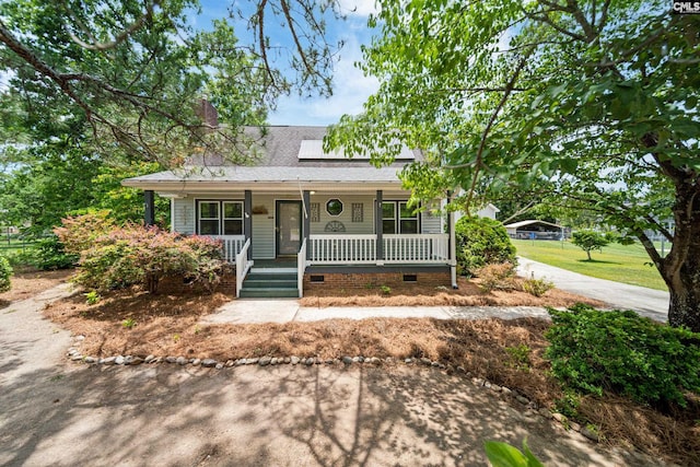 108 Commonwealth Ct, Lexington, SC 29073 - view of front of home with a porch, crawl space, a shingled roof, driveway, and a chimney