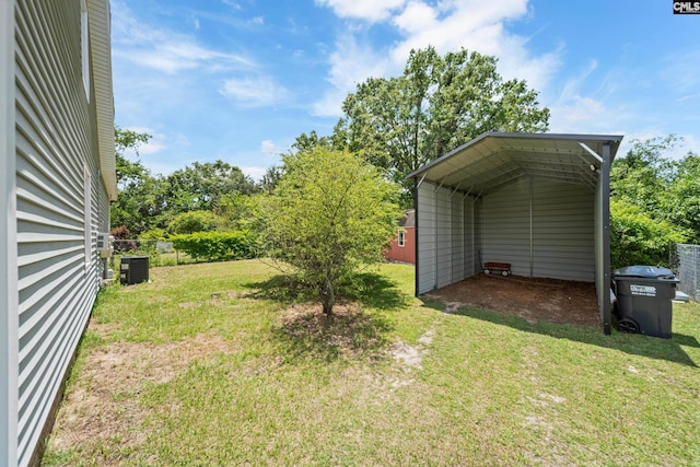 108 Commonwealth Ct, Lexington, SC 29073 - view of grassy yard with a detached carport, central air condition unit, and driveway