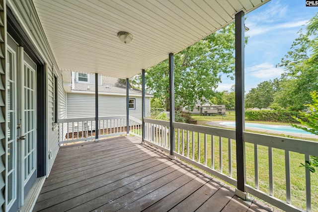 108 Commonwealth Ct, Lexington, SC 29073 - wooden deck with a lawn, an outdoor pool, and french doors