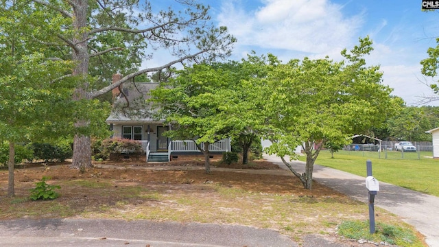 108 Commonwealth Ct, Lexington, SC 29073 - view of property hidden behind natural elements with concrete driveway and covered porch