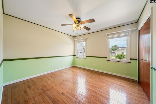 108 Commonwealth Ct, Lexington, SC 29073 - spare room featuring light wood-style floors, a ceiling fan, and baseboards