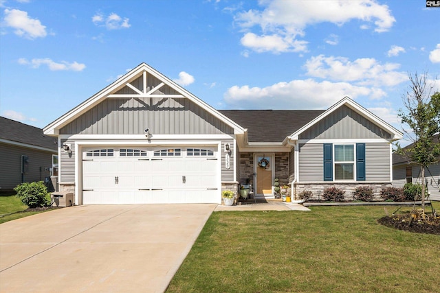 1020 Cameron Ridge Dr, Columbia, SC 29209 - view of front facade with stone siding, concrete driveway, a garage, and a front yard