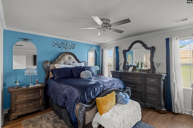 1020 Cameron Ridge Dr, Columbia, SC 29209 - bedroom featuring wood finished floors, crown molding, and ceiling fan