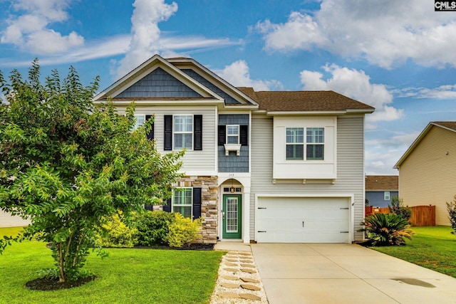 145 Decoy Ct, Sumter, SC 29145 - view of front of house with an attached garage, concrete driveway, and stone siding