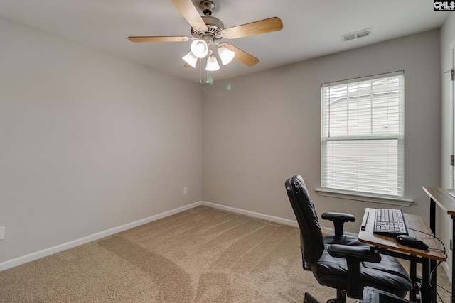 145 Decoy Ct, Sumter, SC 29145 - home office with a ceiling fan, baseboards, and light carpet