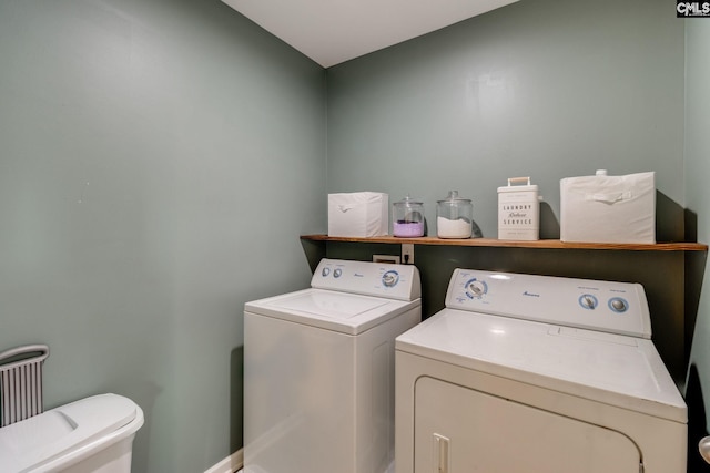 145 Decoy Ct, Sumter, SC 29145 - laundry area featuring washing machine and clothes dryer and baseboards