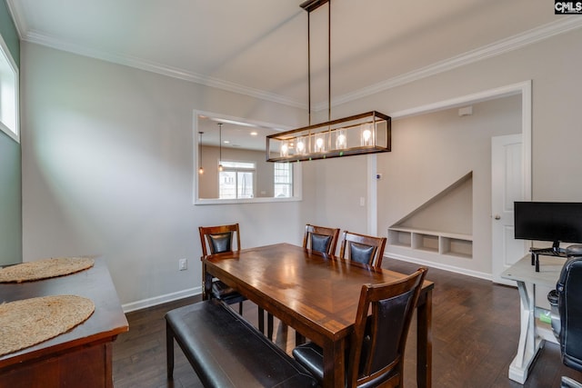 145 Decoy Ct, Sumter, SC 29145 - dining area featuring dark wood-style floors, crown molding, and baseboards
