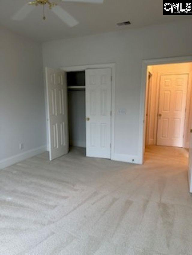 117 York Commons, Lexington, SC 29072 - unfurnished bedroom featuring carpet floors, baseboards, a closet, and ceiling fan