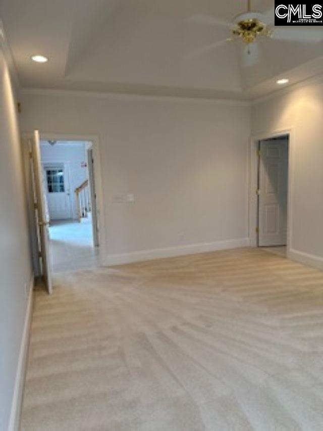 117 York Commons, Lexington, SC 29072 - empty room with light colored carpet, ornamental molding, recessed lighting, baseboards, and a towering ceiling