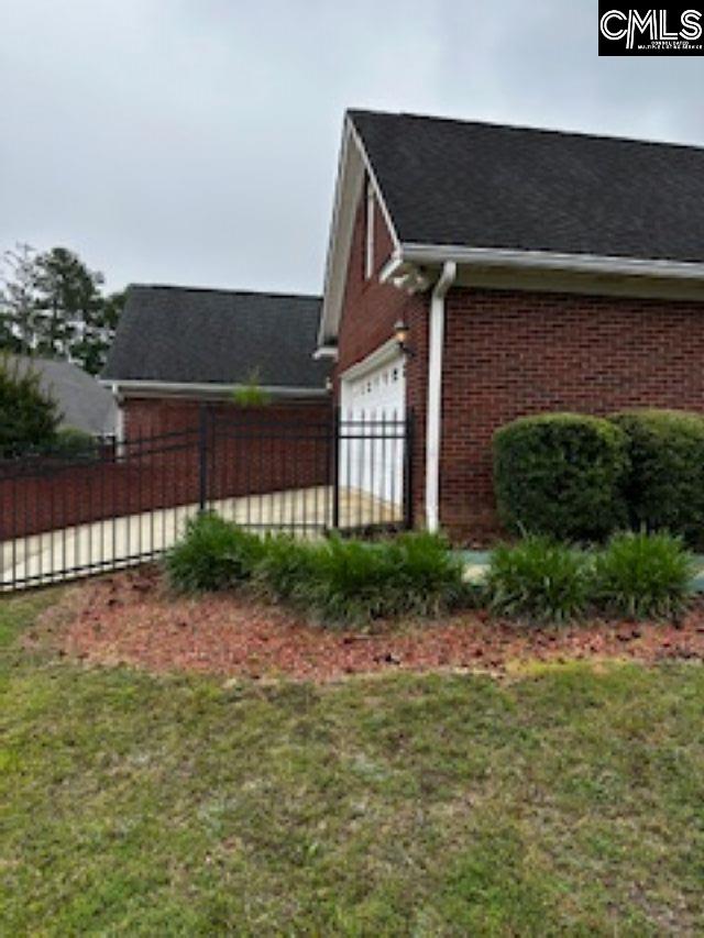 117 York Commons, Lexington, SC 29072 - view of side of property with brick siding and a garage