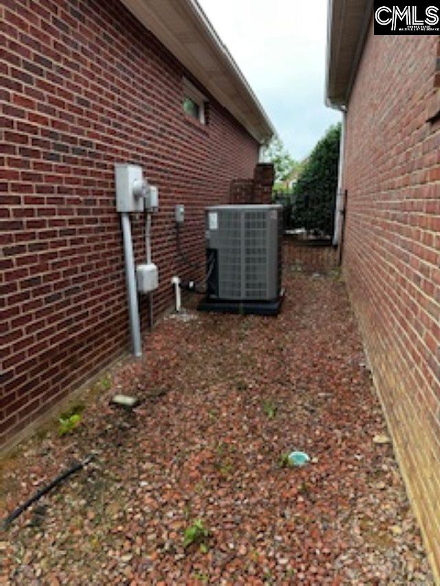 117 York Commons, Lexington, SC 29072 - view of property exterior featuring central air condition unit and brick siding