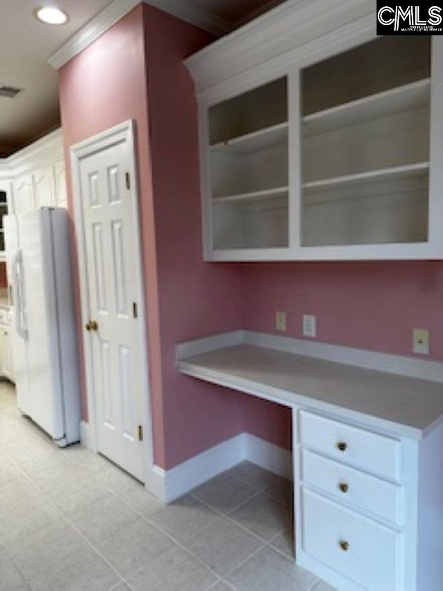 117 York Commons, Lexington, SC 29072 - kitchen featuring freestanding refrigerator, white cabinetry, baseboards, light countertops, and recessed lighting