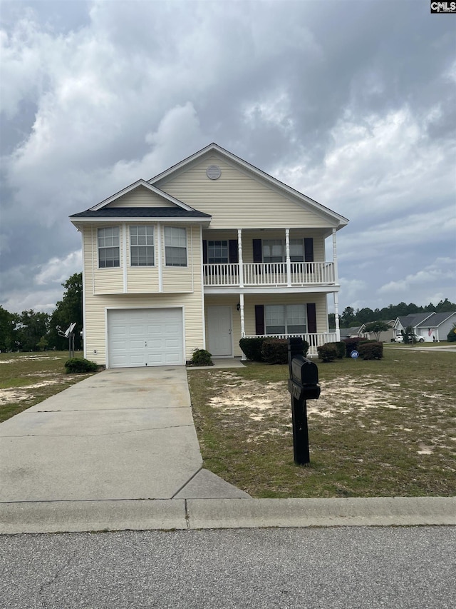 100 Battery Creek Dr, Gaston, SC 29053 - view of front of home featuring an attached garage, concrete driveway, and a balcony