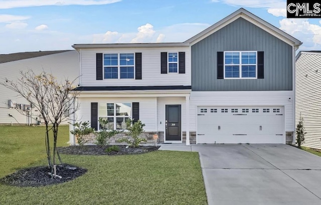319 Ollivander Ln, Elgin, SC 29045 - view of front of property featuring driveway, an attached garage, a front lawn, stone siding, and board and batten siding