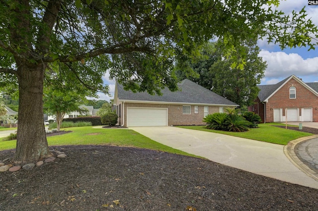 217 Tattlers Trl, Irmo, SC 29063 - view of front of property with brick siding, driveway, a front yard, and a garage