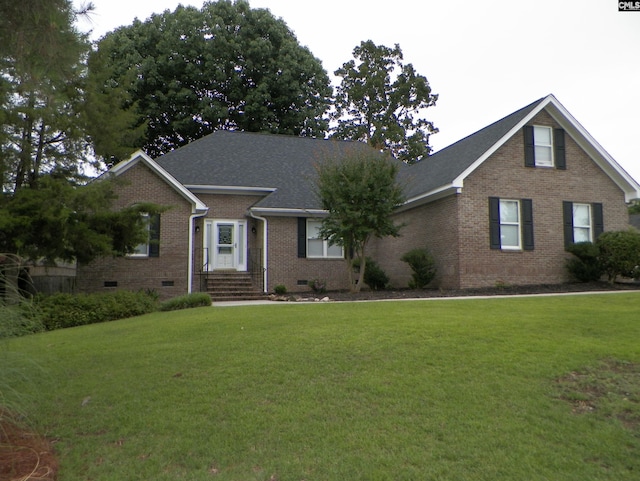 217 Tattlers Trl, Irmo, SC 29063 - view of front of home with brick siding, a front yard, a shingled roof, and crawl space