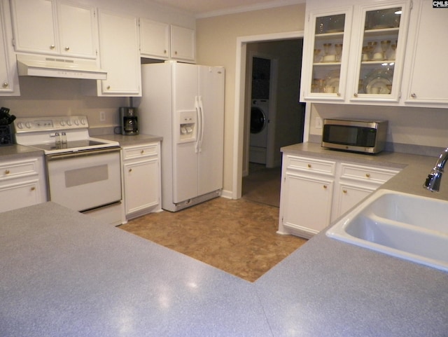 217 Tattlers Trl, Irmo, SC 29063 - kitchen featuring under cabinet range hood, white appliances, a sink, white cabinets, and glass insert cabinets