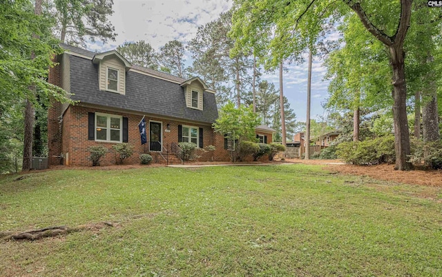 315 Bent Pine Dr, Columbia, SC 29212 - colonial inspired home with brick siding, roof with shingles, and central AC unit